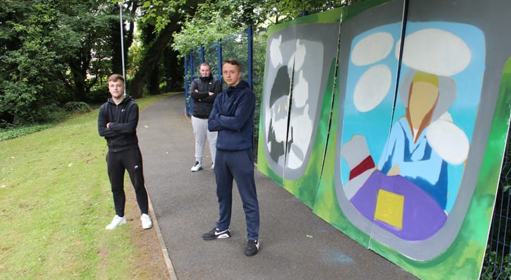 Students Stood Next To The Work In Progress Graffiti